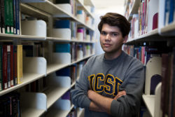 Felipe Morfin Martinez, a former student at Gompers Preparatory Academy, is a communications pre-major at UCSD. He posed for a portrait on May 17, 2017 inside of the Biomedical Library. Megan Wood, inewsource.